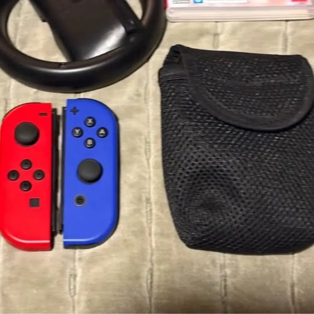 Unpatched Nintendo Switch Bundle – 4 Joy-Cons, 2 Games, Dock, Hard Case, Control